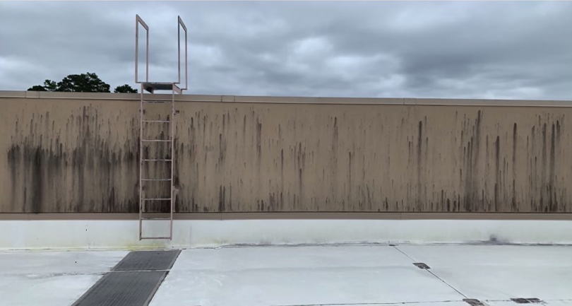 Before photo of commercial exterior surface before pressure washing in Winder Georgia