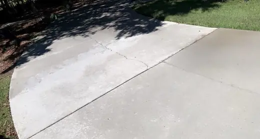 After photo of clean concrete driveway after pressure washing in Winder Georgia