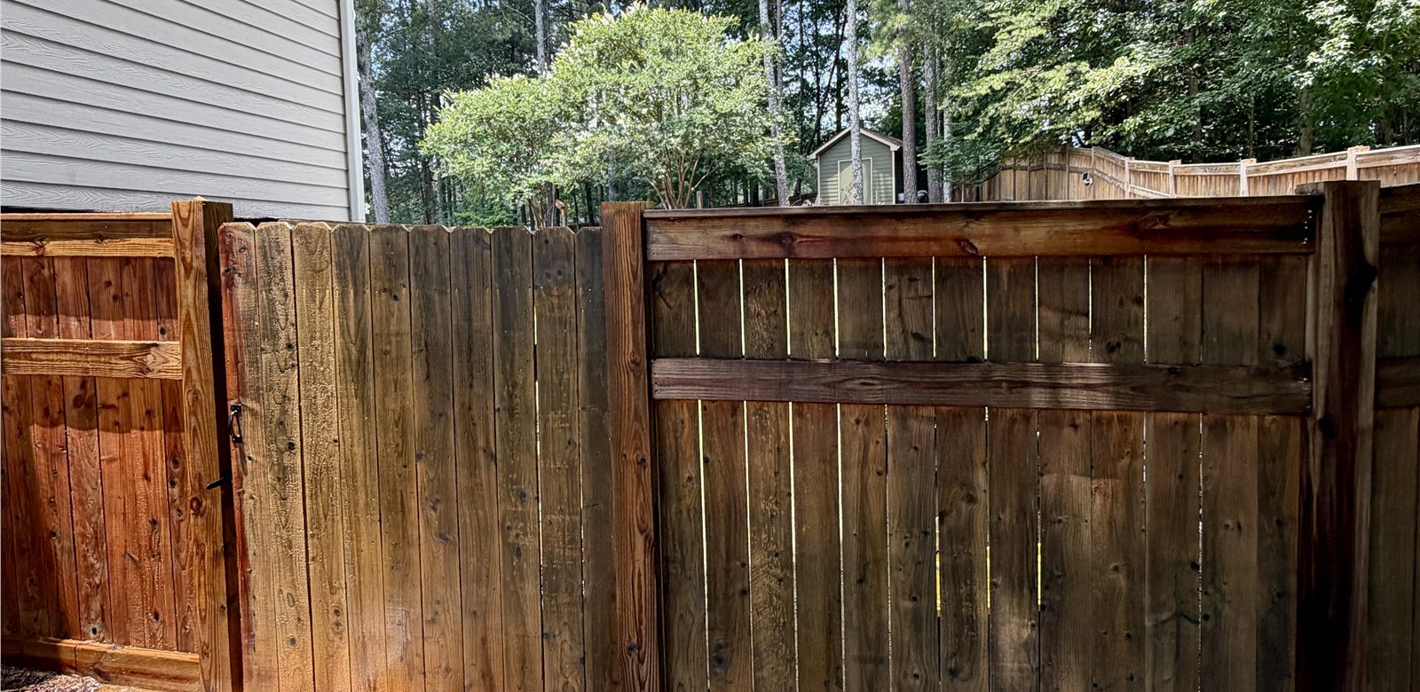 Before photo of wood fence before wood prep and staining in Hoschton Georgia