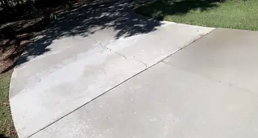 After photo of clean concrete driveway after pressure washing in Winder Georgia