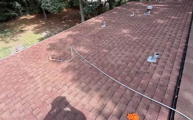 The same shingle roof section with vents in Winder after washing