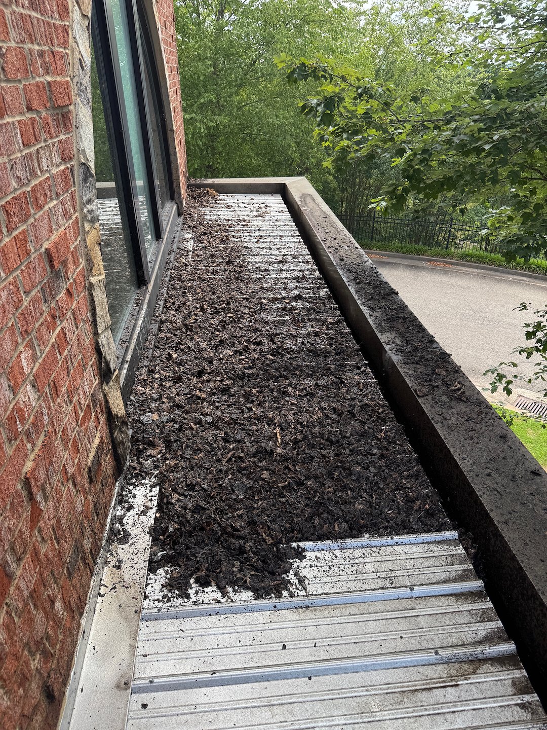 Commercial Gutter Cleaning in Cumming GA at Competition Cheerleading Gym