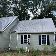 Metal-Roof-Cleaning-in-Hoschton-GA-to-Remove-Organic-Growth-and-Restore-Curb-Appeal 0