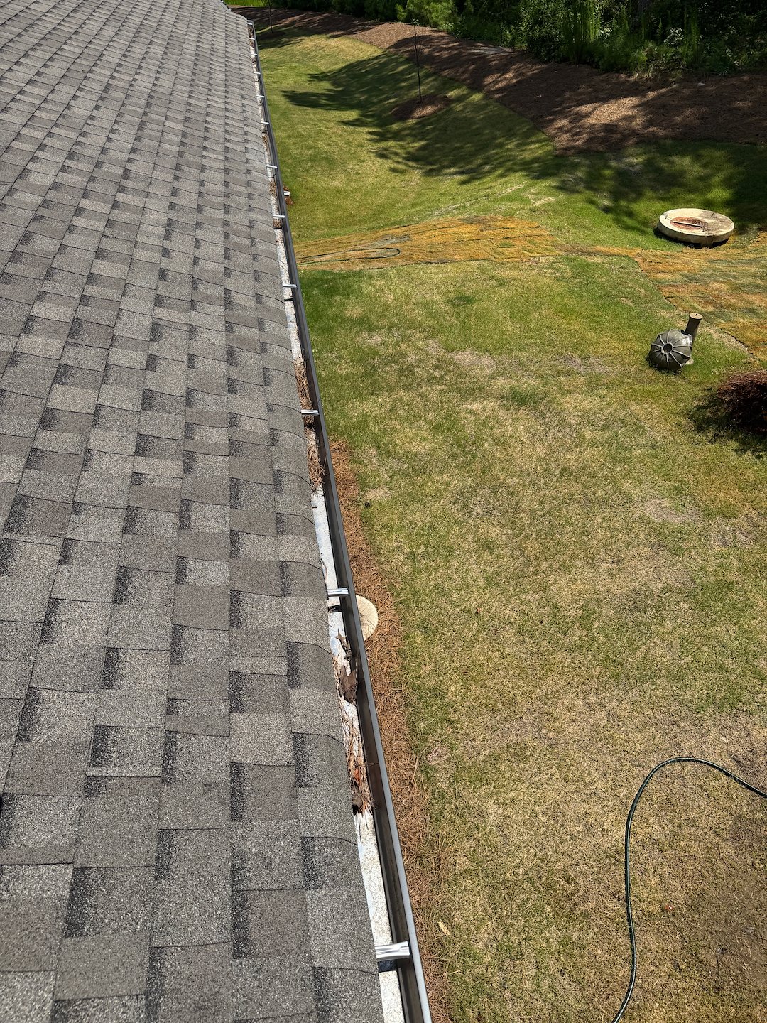 Residential Gutter Cleaning in Loganville GA with Pine Straw Blockage Removal Thumbnail