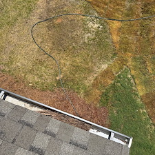Residential-Gutter-Cleaning-in-Loganville-GA-with-Pine-Straw-Blockage-Removal 1