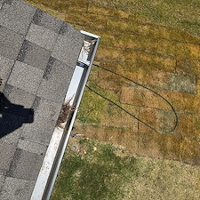 Residential-Gutter-Cleaning-in-Loganville-GA-with-Pine-Straw-Blockage-Removal 0